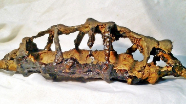 CANOA DEL ALMA Nº 11, hierro fundido, 12 x 44 x 11 cm